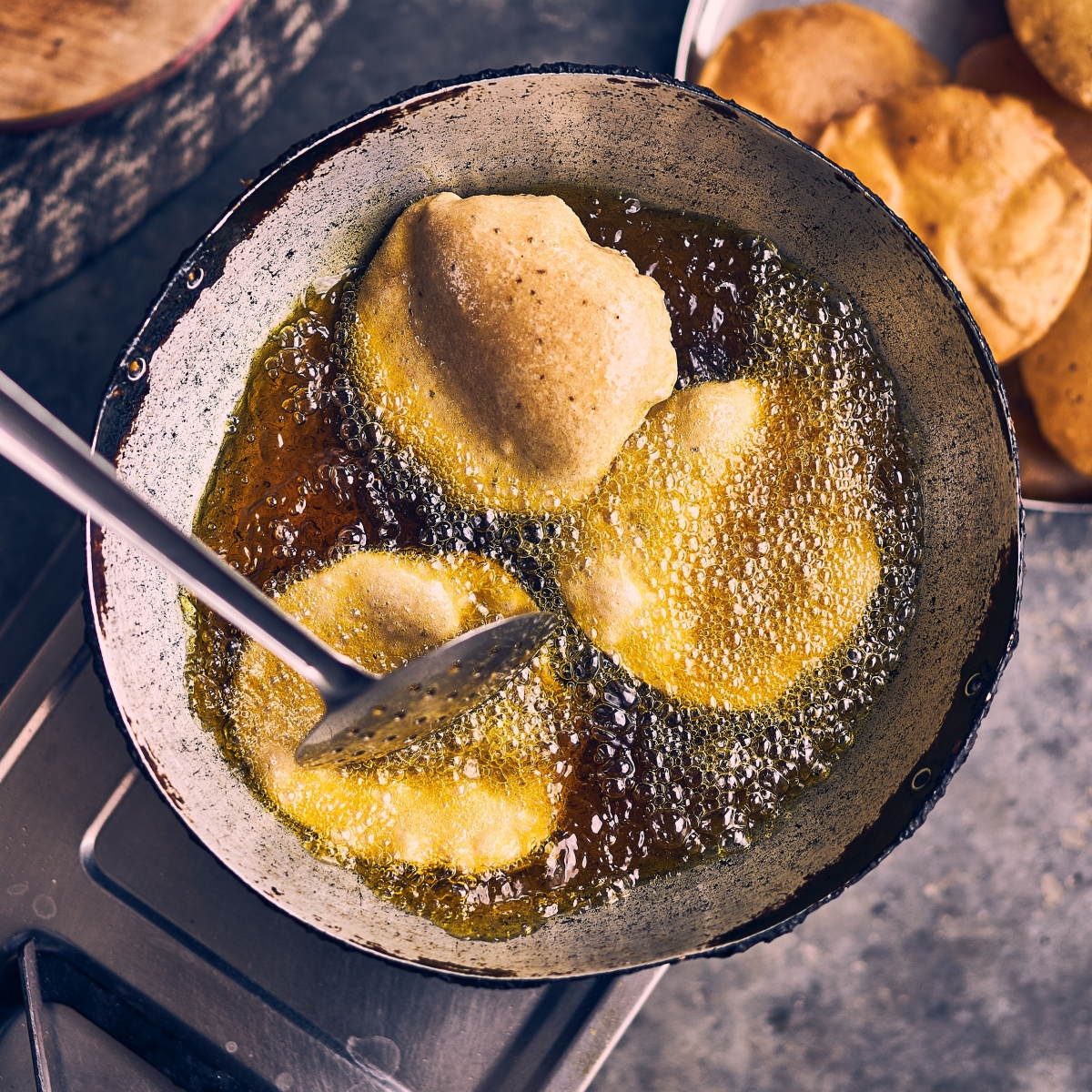 Tortillas frying in oil