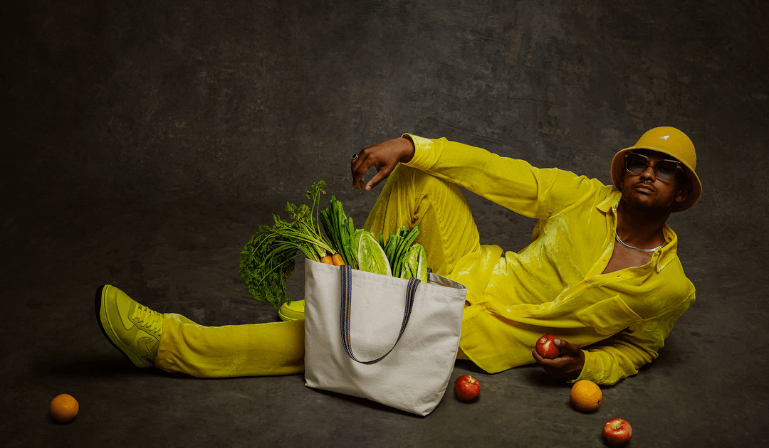 model for SFE's Reuse campaign laying down with a reusable bag