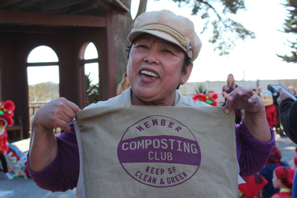 San Francisco Resident holding a compost bag