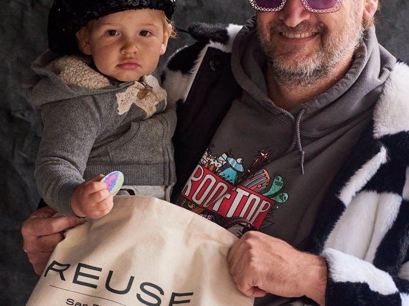 one adult and one baby posing at SFE's Reuse-SF pop-up event