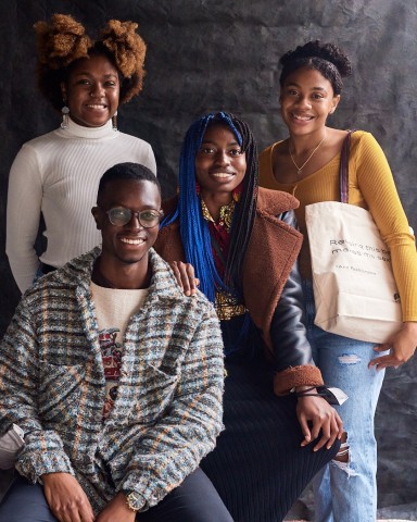 four people posing at SFE's Reuse-SF pop-up event