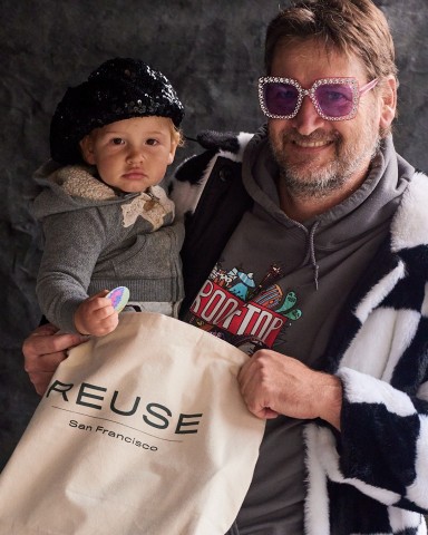 one adult and one baby posing at SFE's Reuse-SF pop-up event