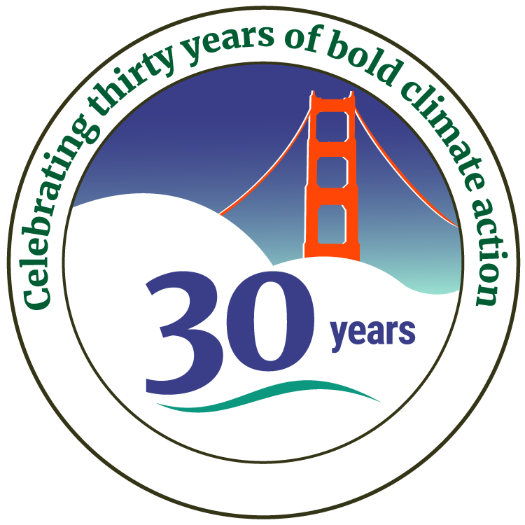 A circular logo that says Celebrating thirty years of bold climate action with large numbers 30 in the middle