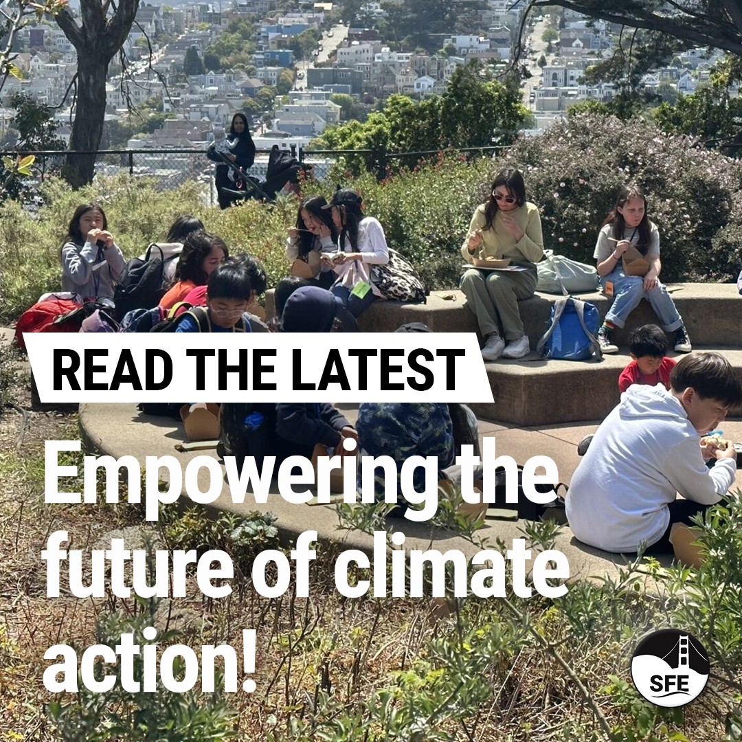 Environmental education team and youth sitting around