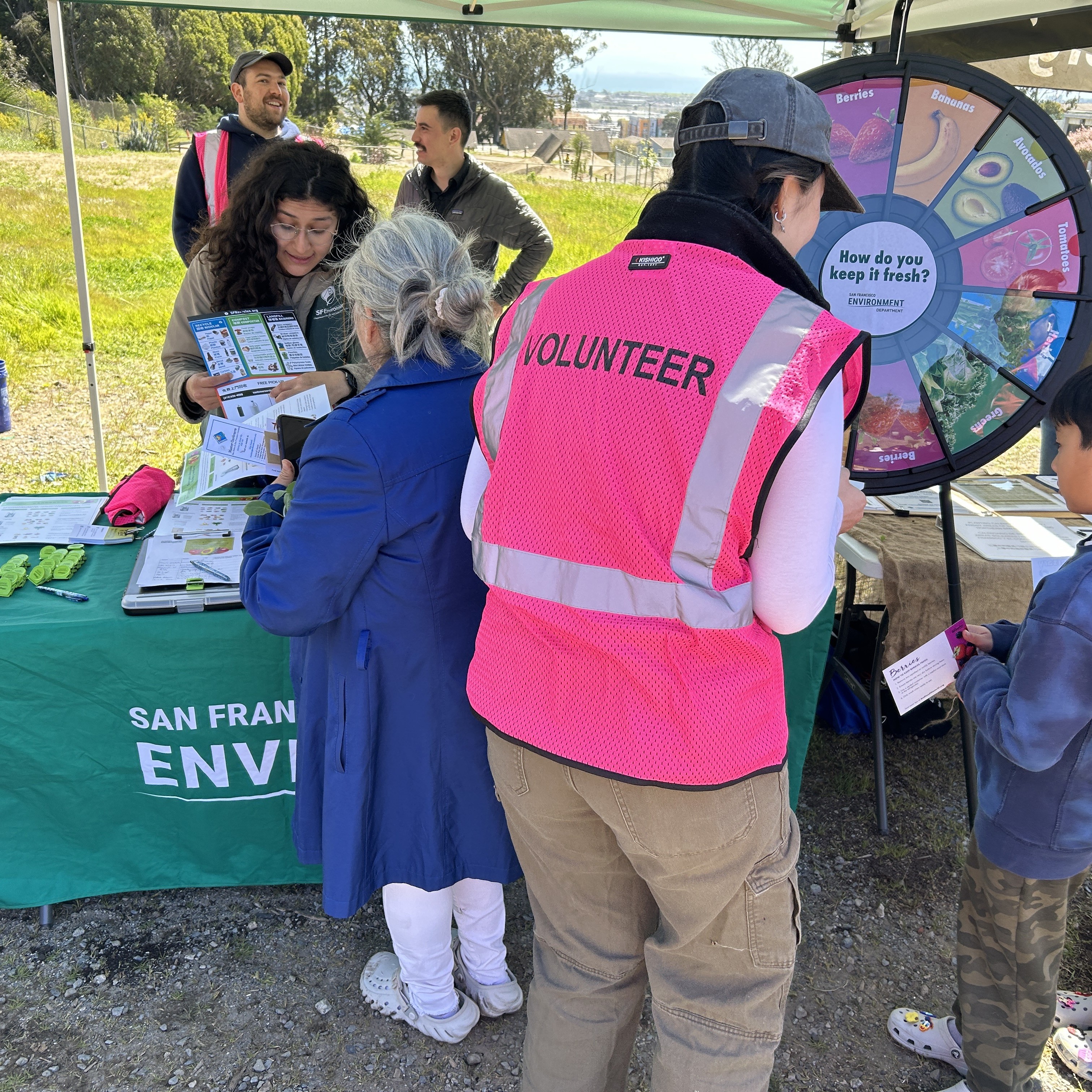 SFE volunteers speak with San Francisco residents at a composting event