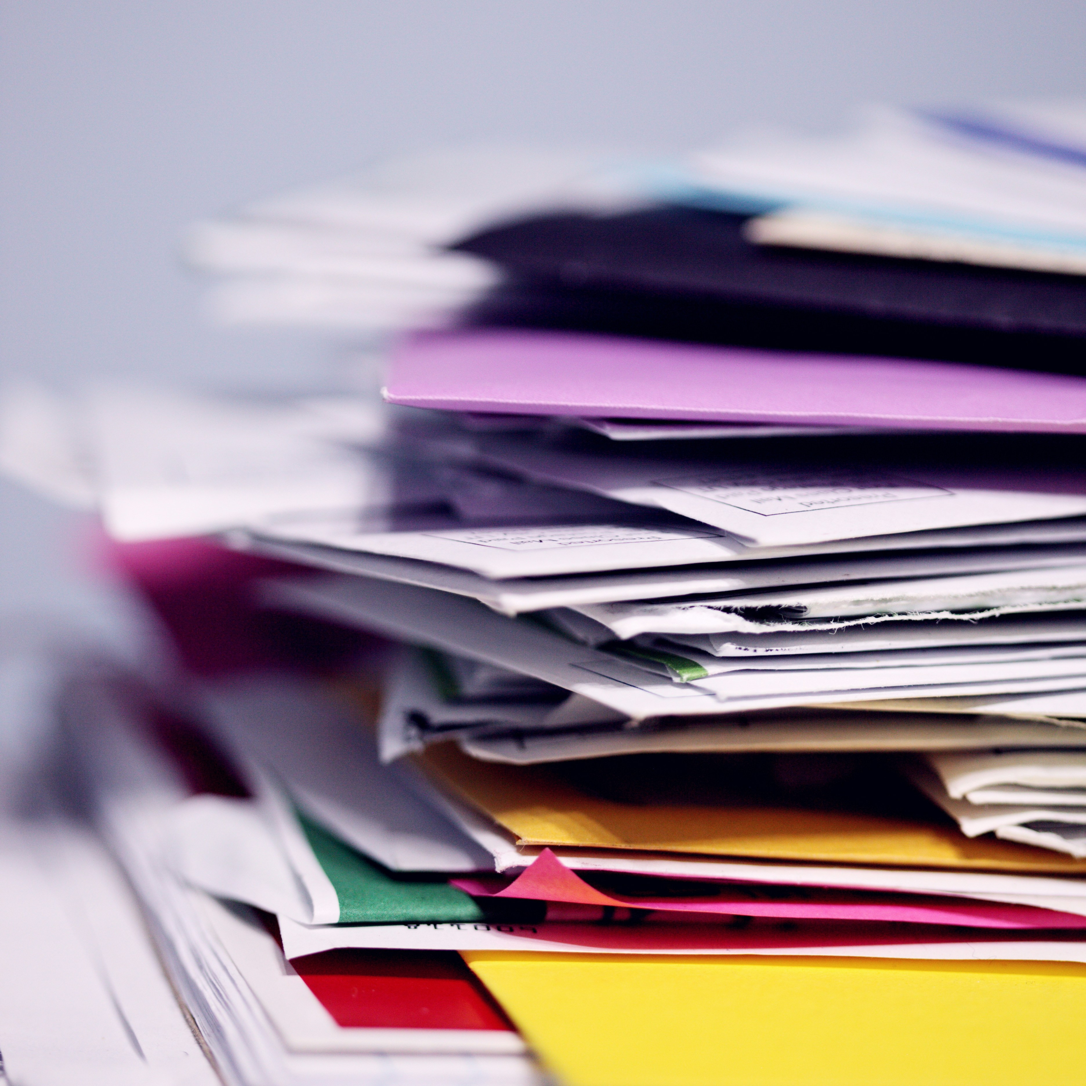A stack of multi-colored papers